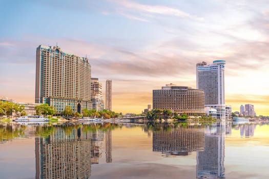 The Nile river with buildings water reflections, beautiful Cairo scenery, Egypt.