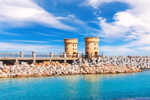 Bridge and towers in the bay of Alexandria, Egypt.