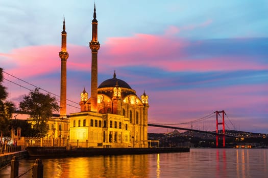 Ortakoy Mosque and the Bosphorus of Istanbul, impressive sunset scenery of the capital of Turkey.