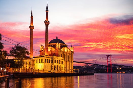 Beautiful sunset on the Ortakoy Mosque and the Bosphorus, Istanbul, Turkey.