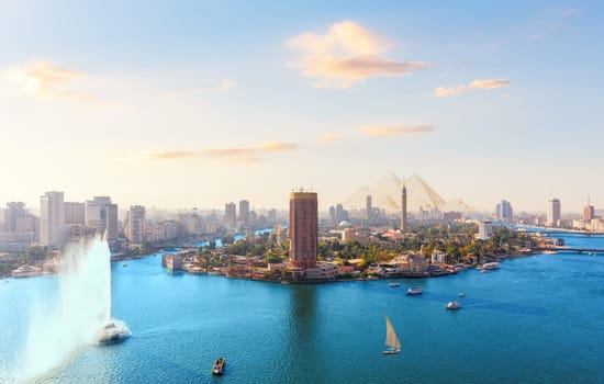 Cairo downtown panorama of the Nile, Gezira island and bridges at sunset, Egypt.