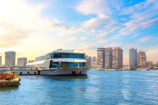 Scenery of the Nile river by the urban buildings of Cairo, Egypt.