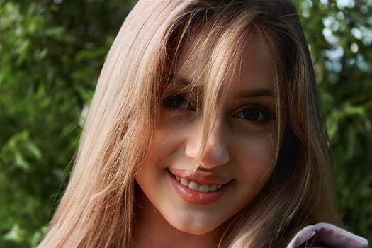 Beautiful sexy attractive girl enlightened by sunset.