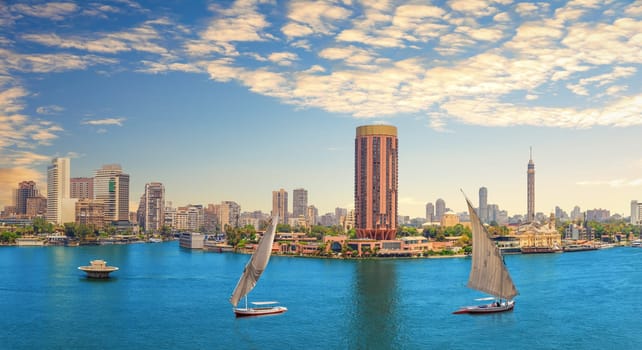 View on the sailboats in the Nile, TV tower and the river bank, Cairo, Egypt.
