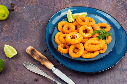 Deep fried calamari or squid rings. Unhealthy food