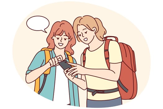 Happy girls travelers with backpacks looking at map on smartphone. Smiling female tourists using cellphone GPS in trip. Travel and technology. Vector illustration.