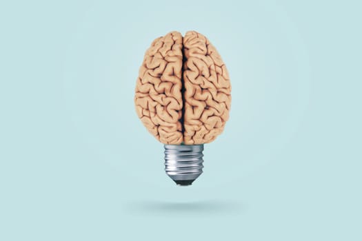 Creative light bulb brain on a light blue background. Brainstorm. Think differently, concept. Creative thinking. fresh thought