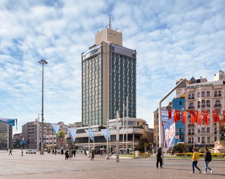 Istanbul, Turkey - May 13, 2023: Exterior of modern architectural design tall building of five stars Marmara hotel, located at Taksim Square, or Taksim Meydani in a spring day