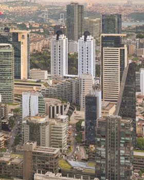 Stunning aerial view from Istanbul Sapphire skyscraper with towering skyscrapers and the Bosphorus Strait in the far end, Istanbul, Turkey