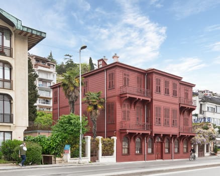 Istanbul, Turkey - May 12, 2023: Late Ottoman residential architecture Halet Cambel Mansion, or Red Mansion, located in Arnavutkoy by Bosphorus Strait. Currently a shoreline state guesthouse