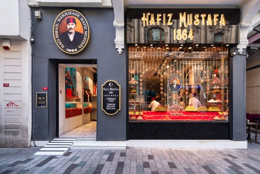 Istanbul, Turkey - May 13, 2023: Display window of Hafiz Moustafa, an old traditional Turkish Delight shop, in Istiklal Street, near Taksim Square