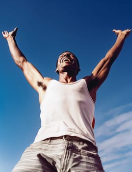 Winner - cheerful African Amerian man enjoying victory while standing with arms raised against blue sky AI generated