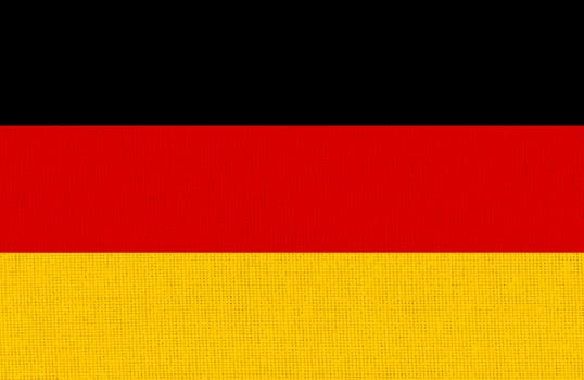 flag of Germany. National German flag on fabric surface. German national flag on textured background. Fabric Texture. European country