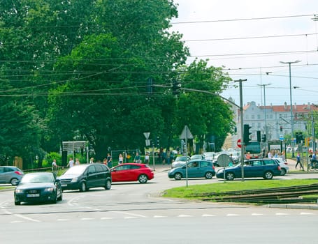 Queue of cars in the street traffic of Gdansk. Line of cars on the road. traffic jam in city. Transport standing in traffic jam. Transport at city crossroads