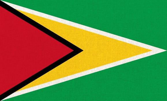 flag of Republic of Guyana. National Guyana flag on fabric texture. national flag on textured background. Fabric Texture. Co operative Republic of Guyana