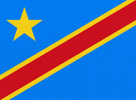 flag of Republic of Congo. National Congolese flag on fabric. Congolese national flag on textured background. Fabric texture. Republic of Congo. African country. State symbol of Congo