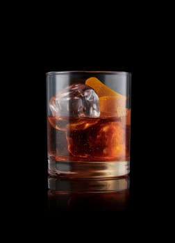 elegant glass of Bourbon Old Fashioned, adorned with a tantalizing twist of orange skin and accompanied by glistening ice cubes.
