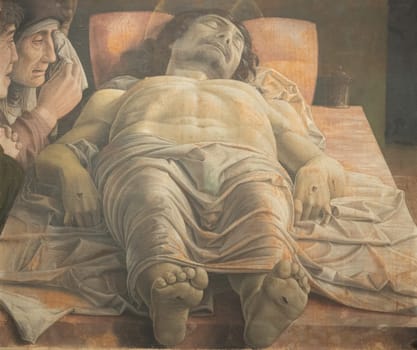 Milan, Italy - 23 September 2023: Brera antique painting museum. Lamentation over the Dead Christ, by Andrea Mantegna, 1483
