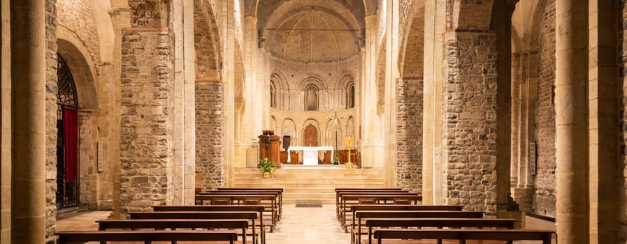Ventimiglia - Italy - Interior of Romanic catholic cathedral with altar, 11th century