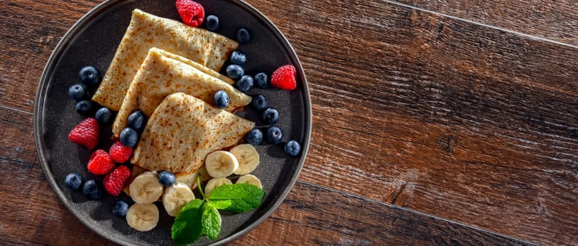 A plate of home-made Polish pancakes filled with sweet cottage cheese