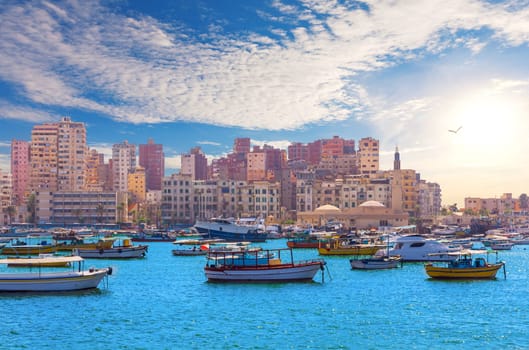 Seashore view of Alexandria, Manar A-Islam Mosque and traditional live buildings, Egypt.