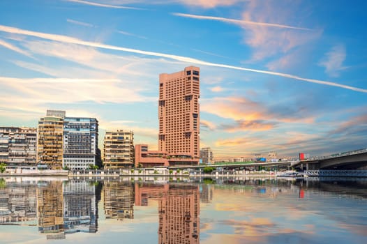 Modern view of Cairo buildings near the bridge over the Nile, Egypt.