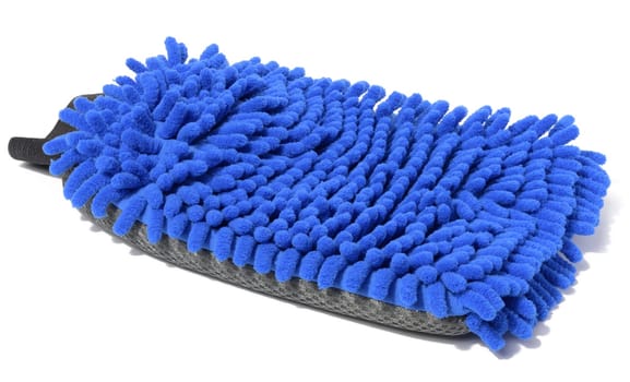 Blue fuzzy cleaning glove on white isolated background