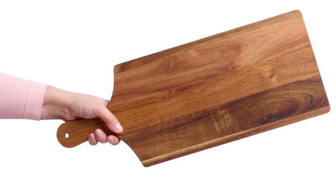 Female hand holding a rectangular wooden cutting board kitchen board