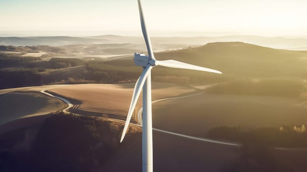 Panoramic view of wind farm or wind park, with high wind turbines for generation electricity with copy space. Green energy concept.