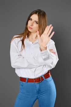 Stop, stop talking about it concept. Woman denies arguments.