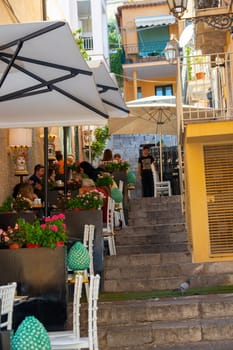 Sicily, Taormina, Italy - 28 September 2023. One of the countless street restaurants on the famous main street Corso umberto in Taormina. City views, facades, architecture.