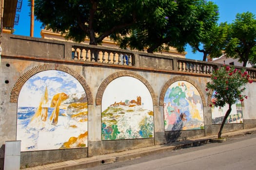 Gioiosa Marea, Sicily, Italy - 27 September 2023. Wall painting in a street leading to the railway station in Gioiosa Marea in the province of Messina.