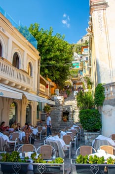 Sicily, Taormina, Italy - 28 September 2023. One of the countless street restaurants on the famous main street Corso umberto in Taormina. City views, facades, architecture.