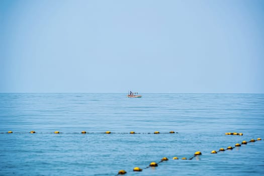 Boat floating in the sea on a good day.