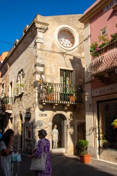 Taormina, Sicily, Italy - 28 September 2023. The main entrance of the luxury shop Dior on the famous Corso Umberto street in Taormina.