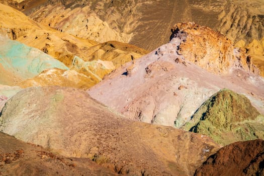 Scenic view of Artist Palette - hills covered in colorful volcanic deposits in Death Valley National Park, California