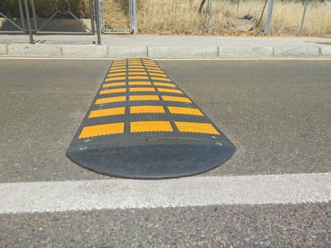 Speed bumps installed at urban area. Visible sideway