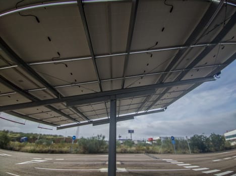 Solar canopy installation over parking. Wide angle lens view