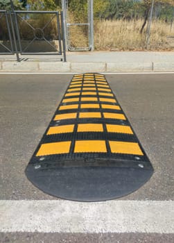 Speed bumps installed at urban area. Visible sideway