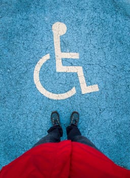 Reserved parking for vehicles of people with disabilities. First person point of view