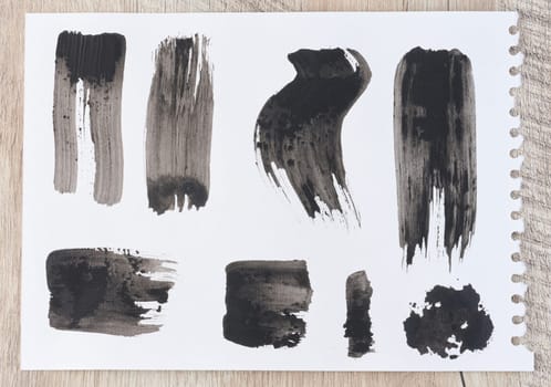 Watercolor brush stroke of black paint, on a white background. Set