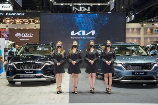Nonthaburi, Thailand - APR 2, 2023 Unidentified model poses with a car at The 44th Bangkok international motor show 2023 at IMPACT Arena, Muang Thong Thani, Nonthaburi, Thailand.