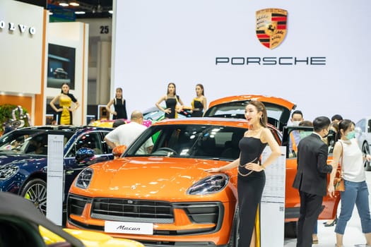 Nonthaburi, Thailand - MAR 26, 2023 Unidentified model poses with a car at The 44th Bangkok international motor show 2023 at IMPACT Arena, Muang Thong Thani, Nonthaburi, Thailand.