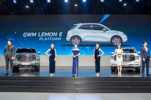 Nonthaburi, Thailand - APR 2, 2023 Unidentified model poses with a car at The 44th Bangkok international motor show 2023 at IMPACT Arena, Muang Thong Thani, Nonthaburi, Thailand.