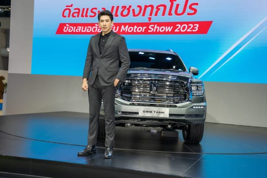 Nonthaburi, Thailand - APR 2, 2023 Unidentified model poses with a car at The 44th Bangkok international motor show 2023 at IMPACT Arena, Muang Thong Thani, Nonthaburi, Thailand.