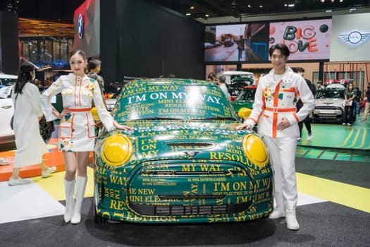 Nonthaburi, Thailand - APR 2, 2023 Unidentified model poses with a car at The 44th Bangkok international motor show 2023 at IMPACT Arena, Muang Thong Thani, Nonthaburi, Thailand.