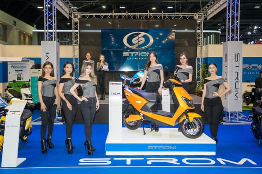 Nonthaburi, Thailand - APR 2, 2023 Unidentified model poses with a car at The 44th Bangkok international motor show 2023 at IMPACT Arena, Muang Thong Thani, Nonthaburi, Thailand.