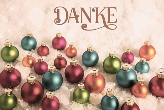 German Text Danke, Means Thanks In English, Many Colorful Christmas Balls Symbolizing Diversity, In The Snow, Vintage Style