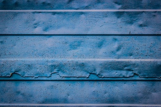 Texture blue corrugated sheet metal fence. Background