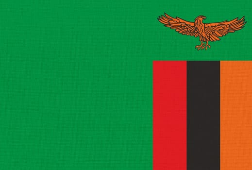 flag of Zambia. National Zambian flag on fabric surface. Zambia national flag on textured background. Fabric Texture. Republic of Zambia. African country. state symbol